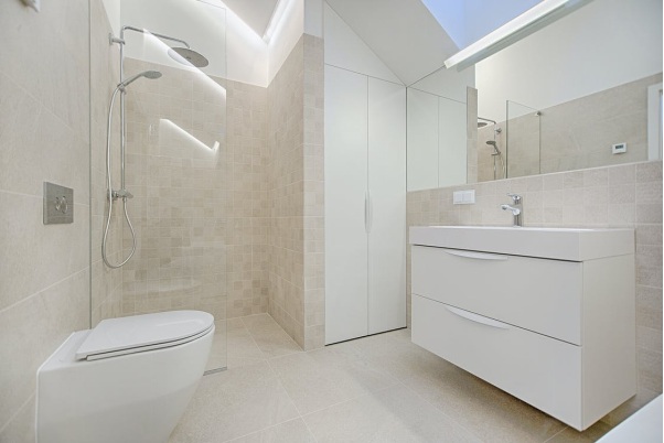 A walk-in shower that takes up less space located in New York.