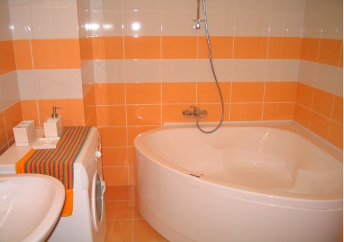 An orange-themed bathroom