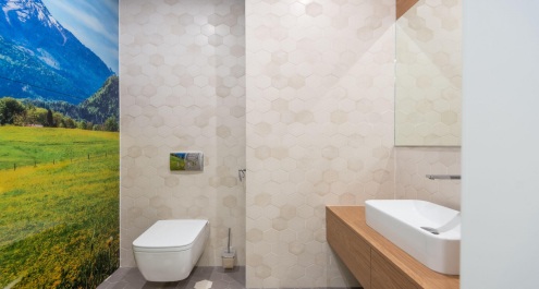 Bathroom with a nature wallpaper