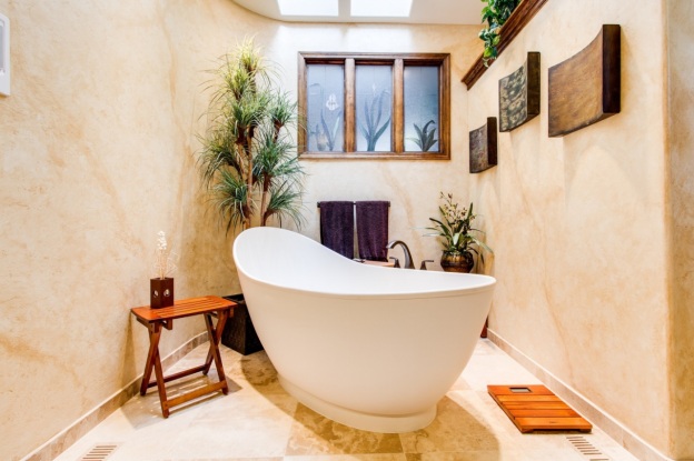 Modern bathroom with a bathtub that’s been refinished